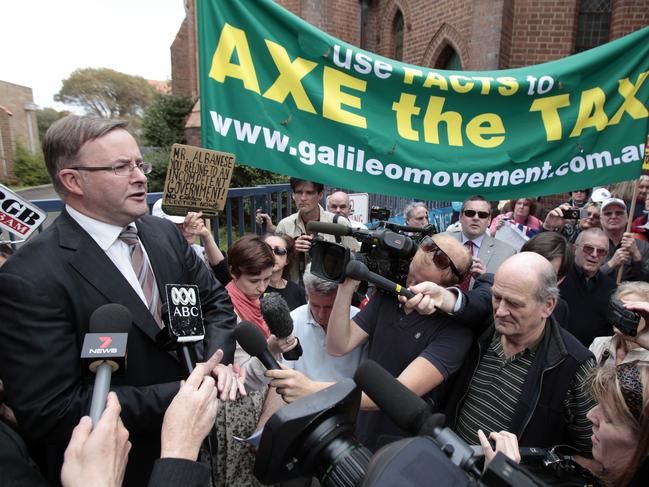 Anthony Albanese talks to an angry crowd at a protest outside his Marrickville electoral office in Sydney during 'Convoy of No Consequence Rally', calling for the government's proposed Carbon Tax to be axed in 2011.