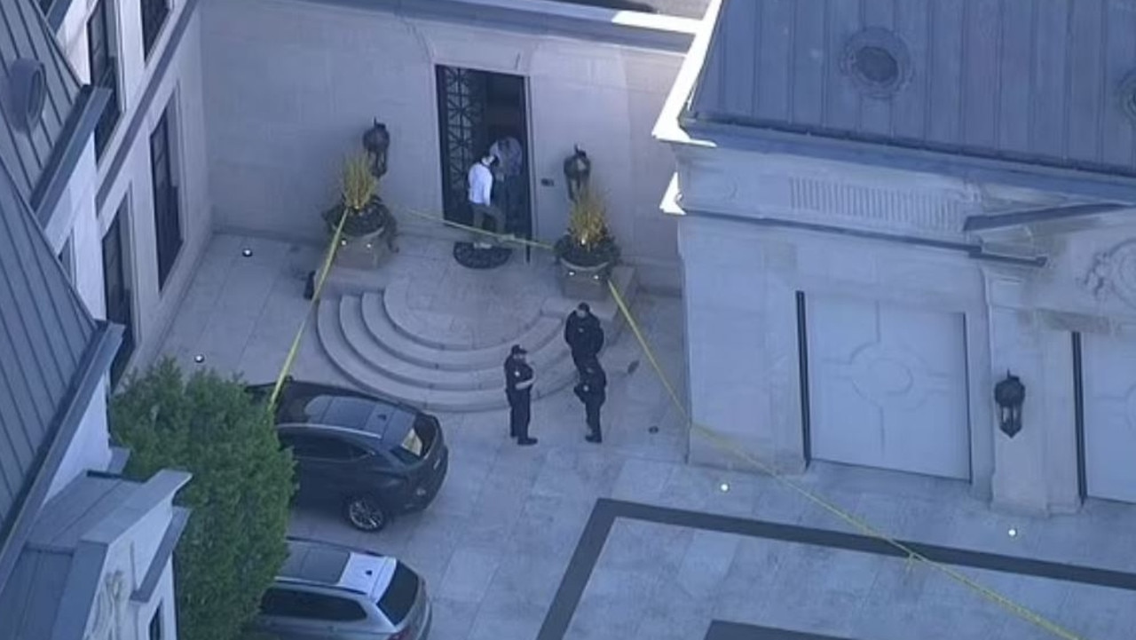 Police outside Drake's Toronto home. Picture: CTV News