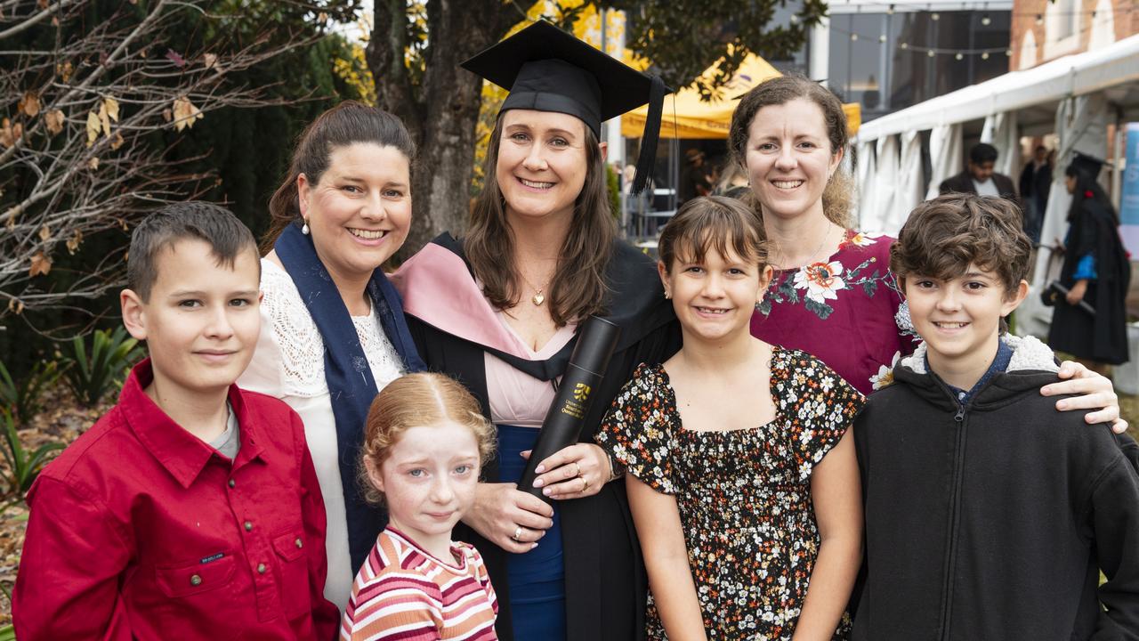 Bachelor of Education (Primary) graduate Sharon Arthur with (from left) Luke Arthur, Lucy Finney, Mya Bray, Ruby Arthur, Candice Patrick and Bailey Bray at a UniSQ graduation ceremony at The Empire, Tuesday, June 25, 2024. Picture: Kevin Farmer