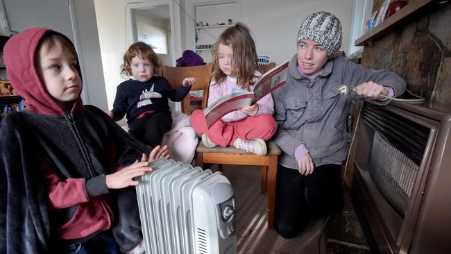 Lilydale mum Casey Pyle and her children Riley, 7, Chelsea, 5, and Jade, 3, have been living with no heater since mid May. Pic: Steve Tanner