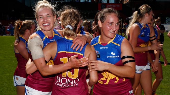 MELBOURNE, AUSTRALIA - JANUARY 31: (L-R) Orla O'Dwyer, Greta Bodey and Breanna Koenen of the Lions celebrate during the 2021 AFLW Round 01 match between the Richmond Tigers and the Brisbane Lions at the Swinburne Centre on January 31, 2021 in Melbourne, Australia. (Photo by Michael Willson/AFL Photos via Getty Images)