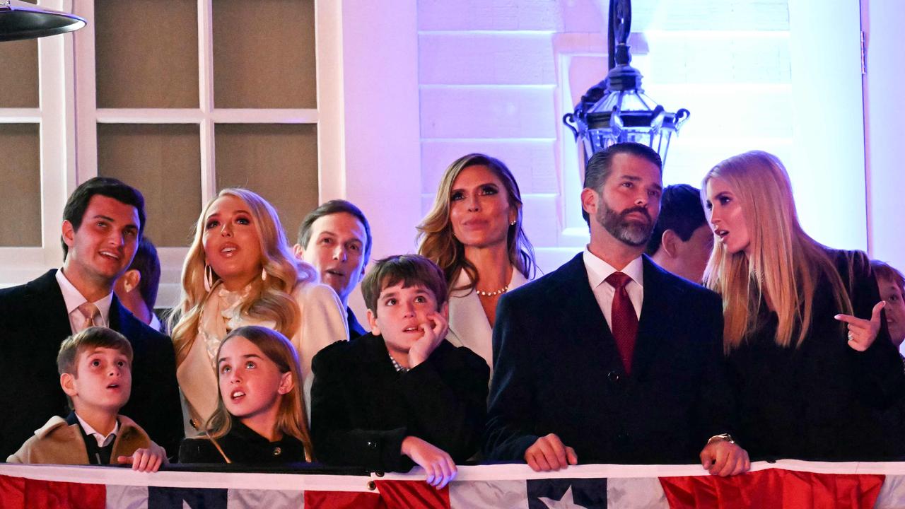 (L-R back) Michael Boulos, Tiffany Trump, Jared Kushner, Bettina Anderson, Donald Trump Jr. and Ivanka Trump watch fireworks during reception in honor US President-elect Donald Trump at Trump National Golf Club Washington DC in Sterling, Virginia.