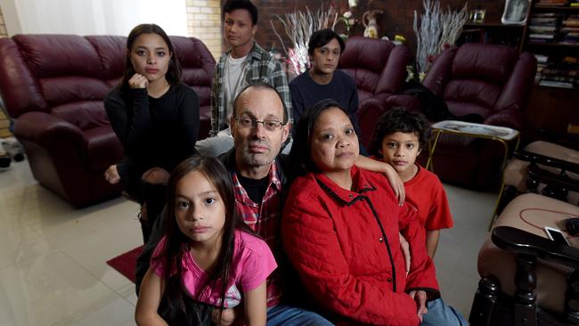 Paul and Ligliwa Otta with their children (clockwise from front) Zoe, Rosal, William, James, and Joshua.Picture: Sam Wundke