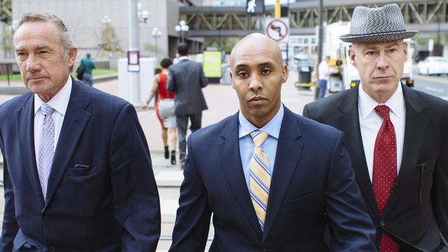 Mohamed Noor (centre) leaves Hennepin County Government Center in May. Picture: Angus Mordant