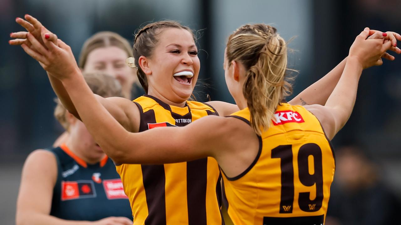 Hawthorn’s Bridie Hipwell and Charlotte Baskaran celebrate during the Hawks’ win over GWS, which kept them in the top two and in the box seat for the $1m prize. picture: Dylan Burns / Getty Images