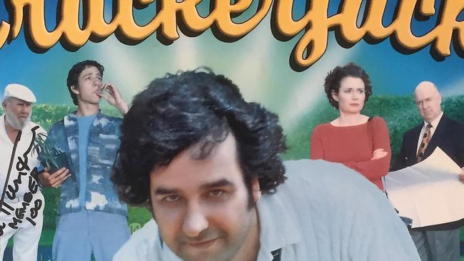 A poster signed by Crackerjack stars Mick Molloy, Bill Hunter and Judith Lucy, which is on display at the Richmond Union Bowling Club. The club was where the idea for the movie was born.