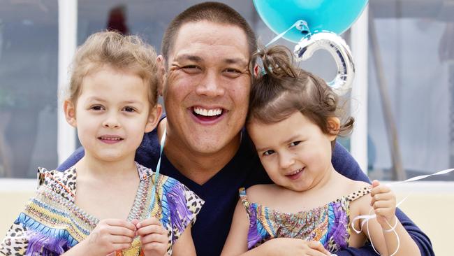 Geoff Huegill with his daughters Milla and Gigi. Picture: Jenny Evans