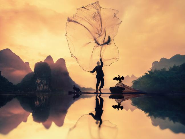 Fisherman ... With its beautiful colors and warm feeling in that small island. I drove for about an hour and a half from where I was staying in Yangzhou in China towered a small Island where I met an old man who spent most of his life fishing. It didn’t take too long from our arrival to the Island to see the light of the sunrise. The elderly Chinese fisherman in his traditional clothes pushed his bamboo boat into the water, carrying with him a fishing net, a light, and two Cormorants. Picture: Khalid Alsabat, Saudi Arabia, 1st Place, National Awards, 2017 Sony World Photography Awards