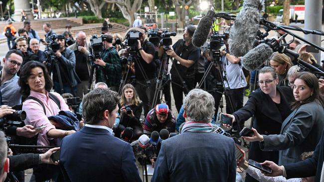 Journalists Nick McKenzie and Chris Masters fronted press. Picture: Saeed Khan / AFP