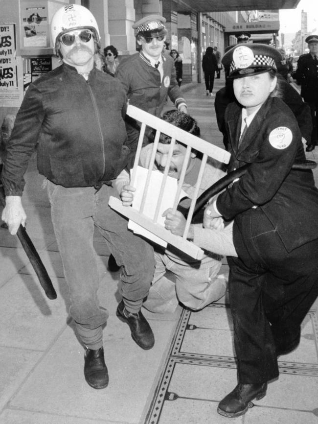 Activist days ... Mundine, then 25, in a mock scene being arrested and jailed during the Commonwealth Games protest rally in Adelaide in 1982.