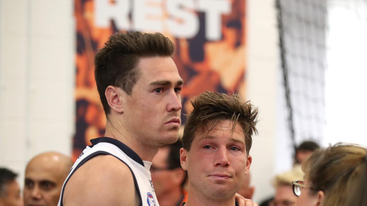 GWS Giants players Jeremy Cameron and Toby Greene dejected in the rooms after losing to Richmond in the 2019 AFL Grand Final at the MCG. Picture. Phil Hillyard