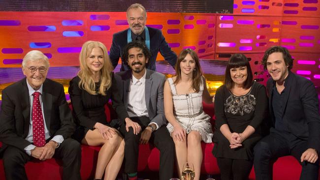 The Graham Norton Show host Graham Norton pictured (back row) with (left to right) Sir Michael Parkinson, Nicole Kidman, Dev Patel, Felicity Jones, Dawn French and Jack Savoretti. Supplied by Channel 10.