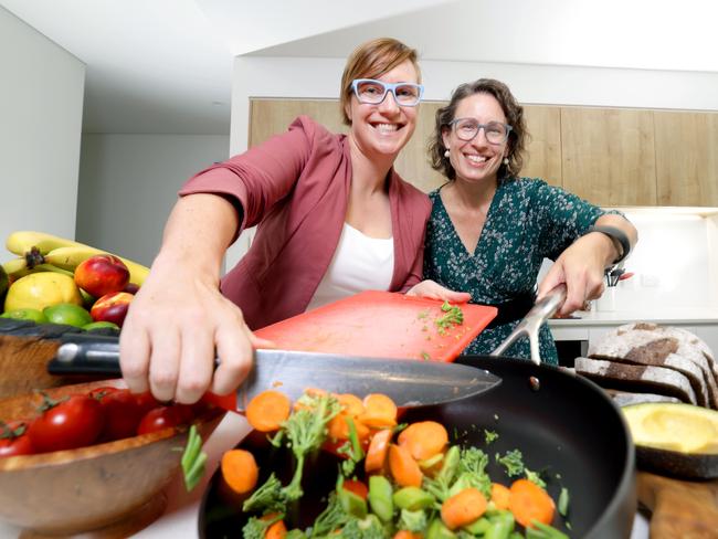 L to R, Professor Lauren Ball, Vice President of Dietitians Australia, with Dr Fiona Willer the President of Dietitians Australia, on saving money while eating healthy during cost of living crisis, cheap healthy food, Stones Corner - Photo Steve Pohlner, on Friday 21st February 2025 - Photo Steve Pohlner