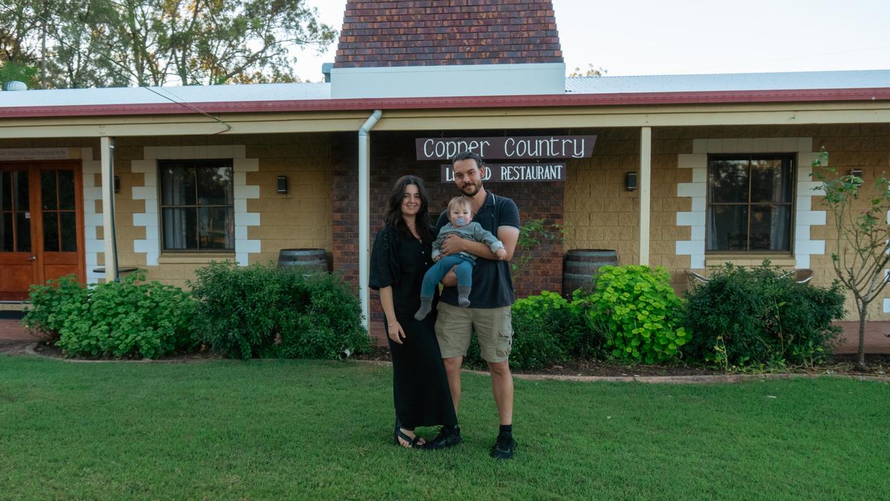 Alex Mengual, Mark Matula, and their son Matteo at the Copper Country Motor Inn shortly after arriving.