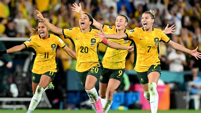 Mary Fowler, Sam Kerr, Caitlin Foord and Steph Catley celebrate the team’s win over France.