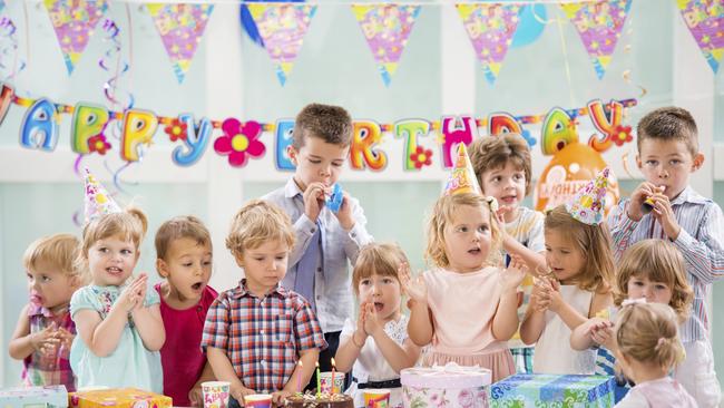 Large group of children having fun while singing and celebrating at birthday party. Picture: iStock