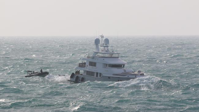 A Rigid Hull Inflatable Boat team rescue mariners from MY Vivierae II off the coast of Northern Australia.