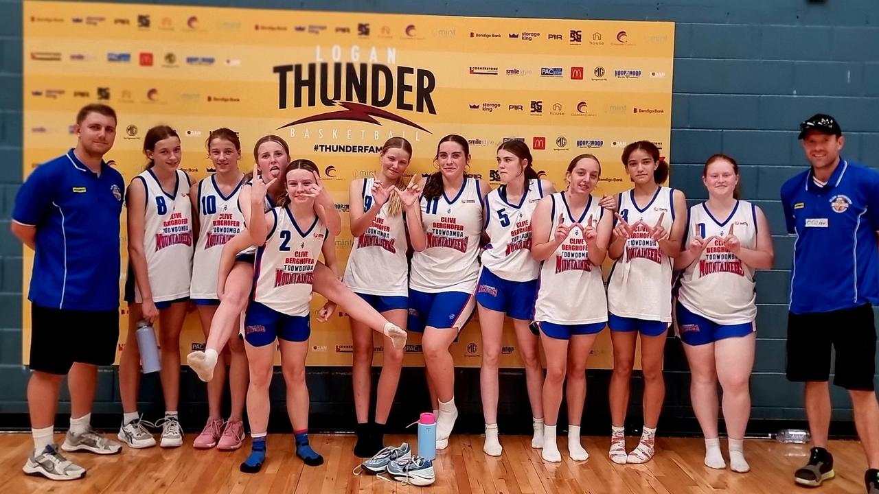 The Toowoomba Mountaineers under-16 girls squad celebrate a win.