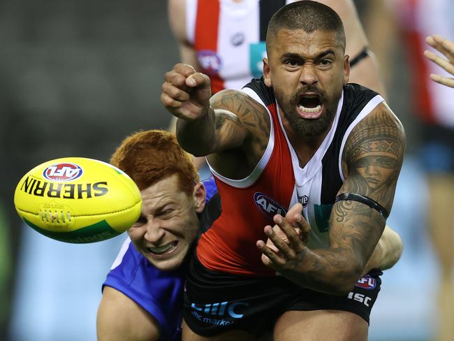 Bradley Hill wins a clearance under pressure from Ed Richards. Picture: Michael Klein