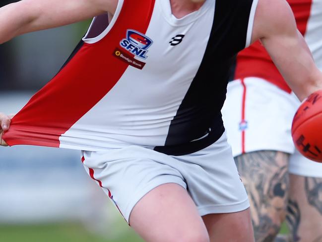 SFNL Football: Bentleigh v St Kilda City at Bentleigh Reserve. Malcolm Neiwand has a passenger. Picture: Steve Tanner