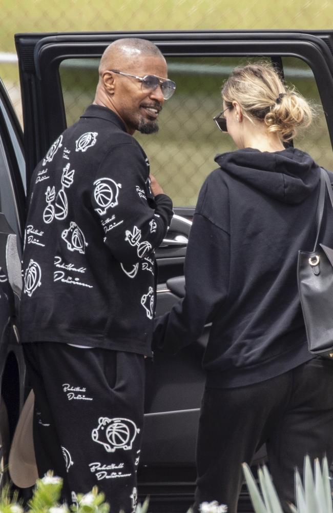 The couple was seen smiling as they hopped into a car during their holiday. Picture: Splash/Backgrid