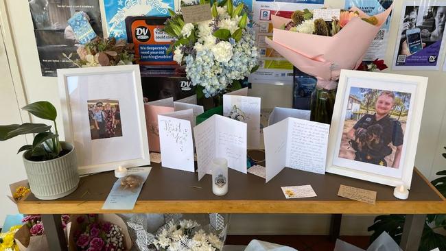 Tributes at the Dalby Police Station with pictures of fallen officers Rachel McCrow and Matthew Arnold.