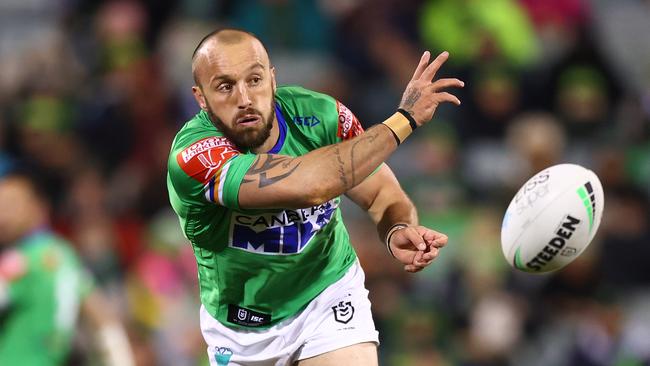 CANBERRA, AUSTRALIA - JUNE 12: Josh Hodgson of the Raiders passes during the round 14 NRL match between the Canberra Raiders and the Brisbane Broncos at GIO Stadium, on June 12, 2021, in Canberra, Australia. (Photo by Mark Nolan/Getty Images)