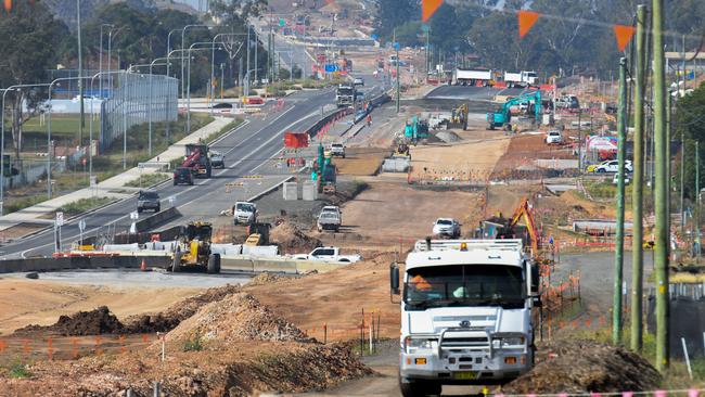 Work continues on the Bringelly Rd upgrade on Tuesday. The Northern and Bringelly Road upgrades are part of a $3.6 billion western Sydney infrastructure plan.