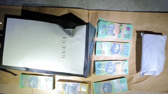 Some of the cash cops allegedly recovered after searching the southwest Sydney properties. Picture: NSW Police