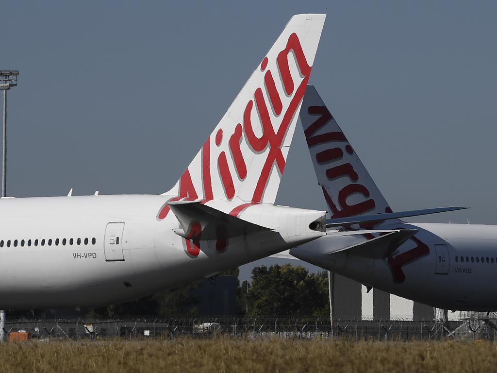 Virgin Australia will cull 3000 staff, fly only 737 aircraft and focus on domestic and short-haul international routes. Picture: Albert Perez/Getty Images