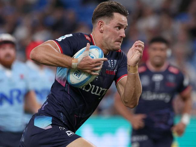 Rebels' Lachie Anderson runs in a try during the Super Rugby win agaisnt the Waratah. Picture: AFP