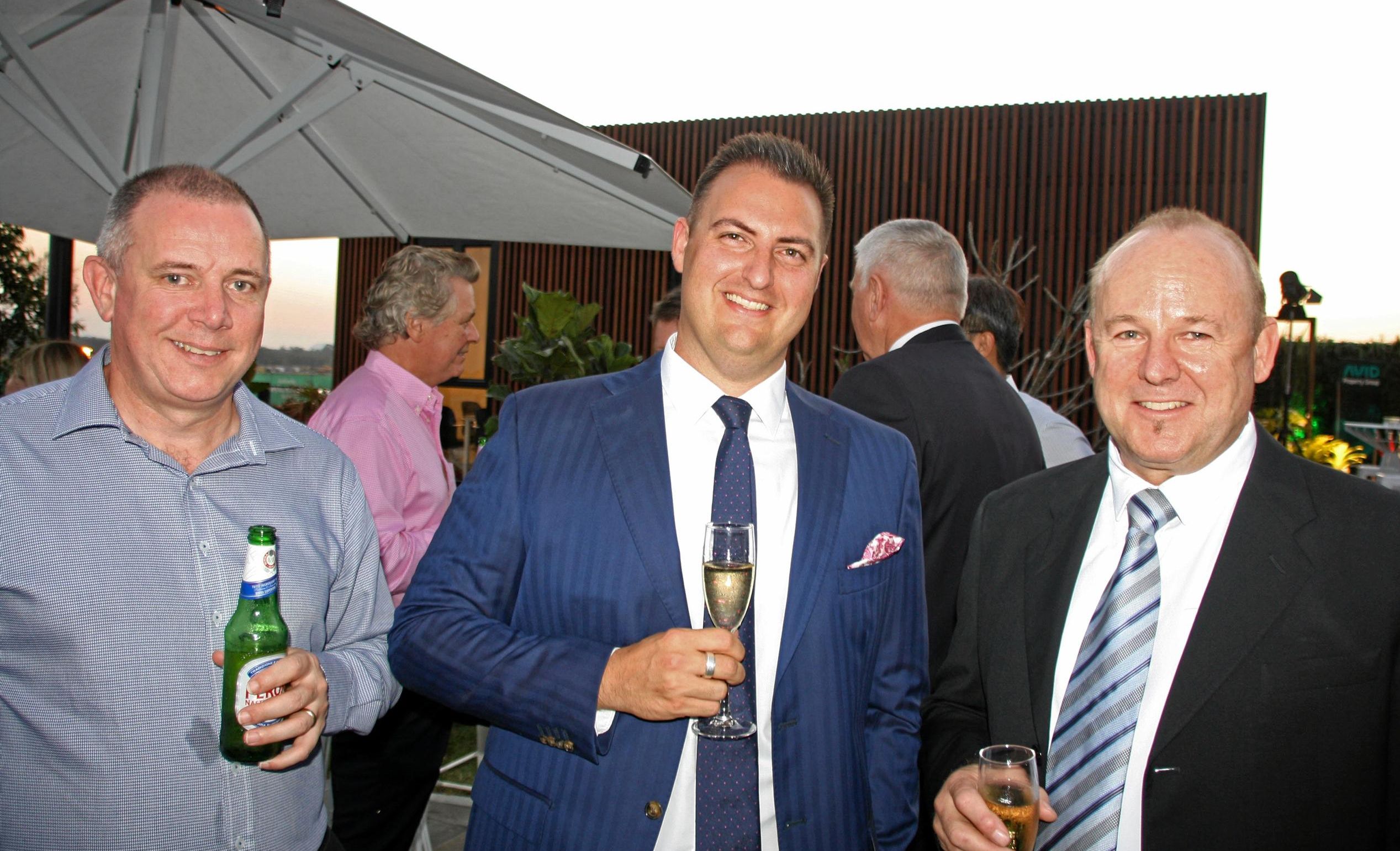 AVID's Mark Lynam and Anthony Demiris with Steve Morcombe of Morcraft Homes at AVID Property Group's launch of its new sales and information centre in Palmview's master-planned community of Harmony. Picture: Erle Levey