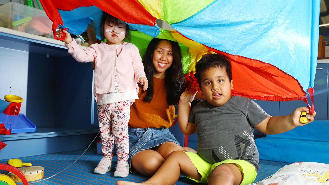 Early Years Special Education teacher Diana Backhouse with Shion 4, and Harrison 5 at Nursery Road State Special School at Holland Park. Picture: Lachie Millard