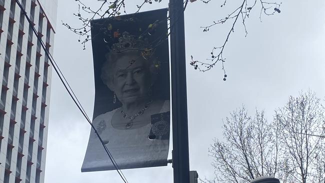 One of several corflutes lining King William St in the heart of Adelaide’s CBD commemorating Her Majesty. Picture: Dixie Sulda