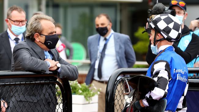 Trainer Andreas Wohler (left) speaks with jockey Kerrin McEvoy after his winning ride aboard Ashrun in the Hotham Stakes at Flemington. Picture: Getty Images