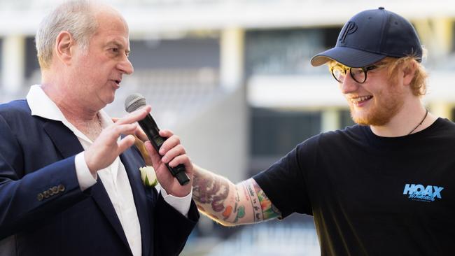 Ed Sheeran jokes with Mushroom Group chair and music promoter Michael Gudinski at Optus Stadium. Picture: AAP Image/Richard Wainwright