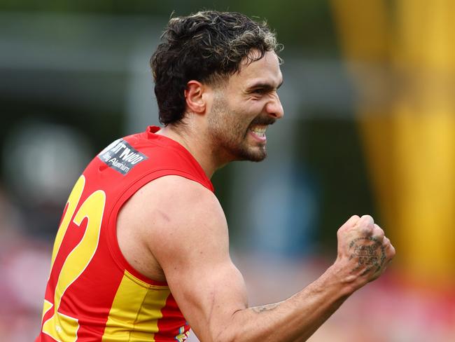 GOLD COAST, AUSTRALIA - JULY 31: Izak Rankine of the Suns celebrates during the round 20 AFL match between the Gold Coast Suns and the West Coast Eagles at Metricon Stadium on July 31, 2022 in Gold Coast, Australia. (Photo by Chris Hyde/Getty Images)