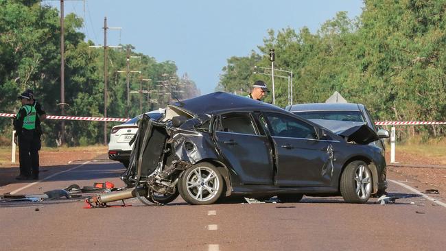 Police at the scene of the three-vehicle crash on the Arnhem Hwy. Picture: Glenn Campbell