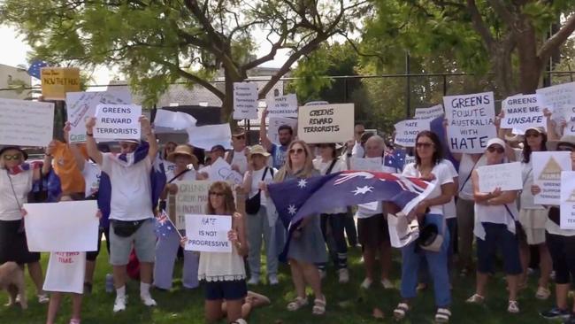Anti-Greens protesters march at the Greens ‘Southside Community BBQ event at the busy Chapel Street Princes Gardens precinct. Picture: Supplied
