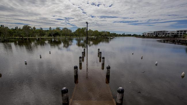 Floodwater  due to heavy rain over the past few days is finally receding at Emerald Lakes, Carrara. Picture: Jerad Williams