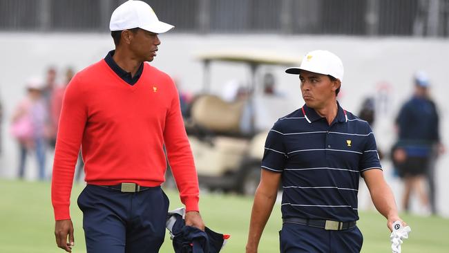 Woods and Presidents Cup USA teammate Rickie Fowler talk tactics in Melbourne. Picture: AFP