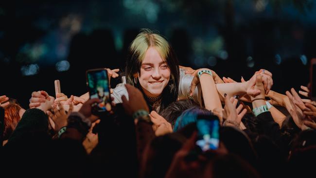 Billie Eilish crowd surfs at a rare acoustic show. Picture: Apple Music