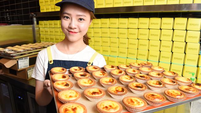 Fiona Tan with a tray of the Hokkaido baked cheese tarts. Picture: Lawrence Pinder