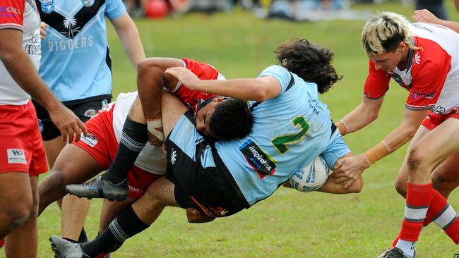 Woolgoolga's Kade Levingstone met in a heavy tackle. Picture: Leigh Jensen