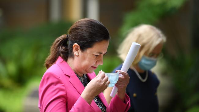 BRISBANE, AUSTRALIA - NewsWire Photos - APRIL 1, 2021. Queensland Premier Annastacia Palaszczuk and Chief Health Officer Dr Jeanette Young leave a press conference after announcing the end of a 3-day lockdown which was imposed due to a COVID-19 cluster. Picture: NCA NewsWire / Dan Peled