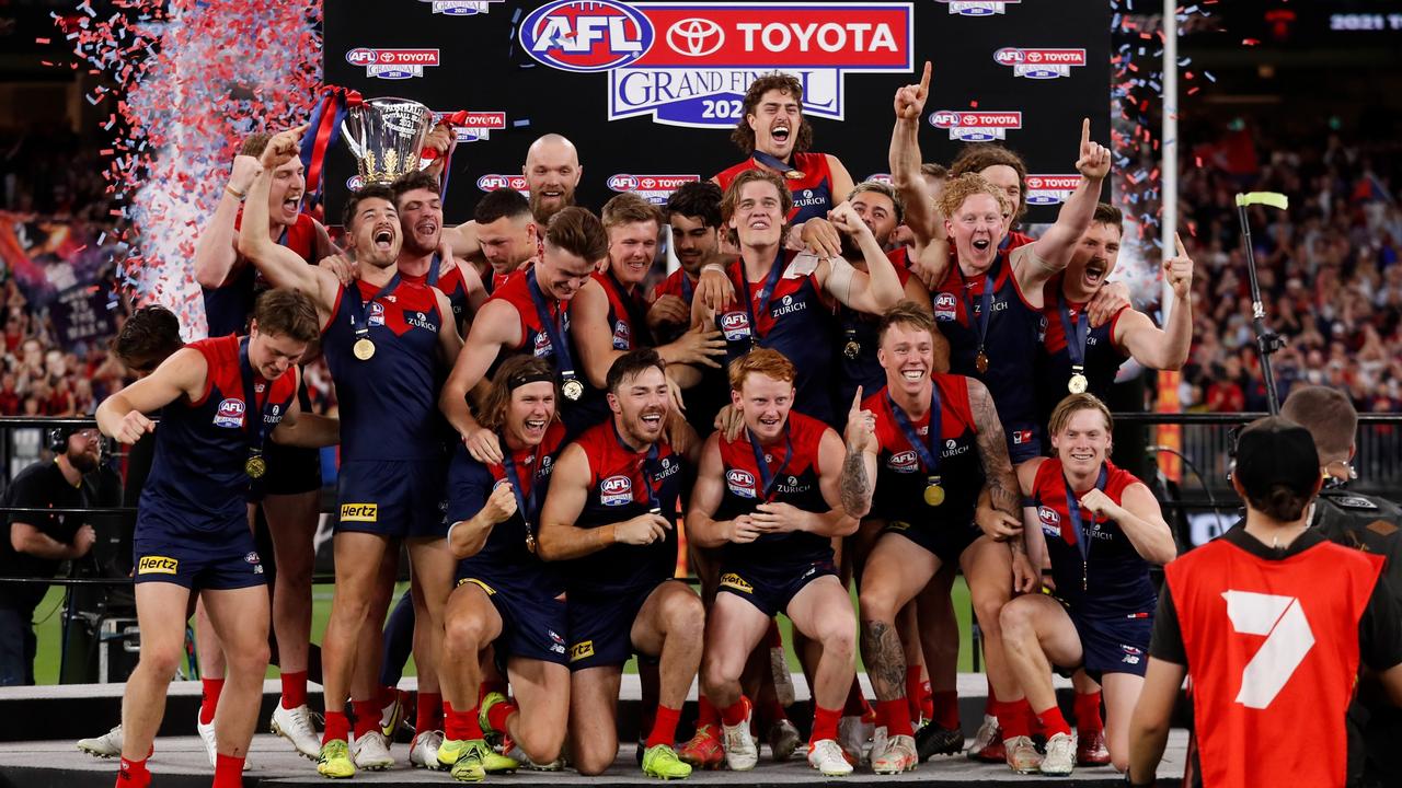 The Demons celebrate the long-awaited victory. Photo by Michael Willson/AFL Photos via Getty Images