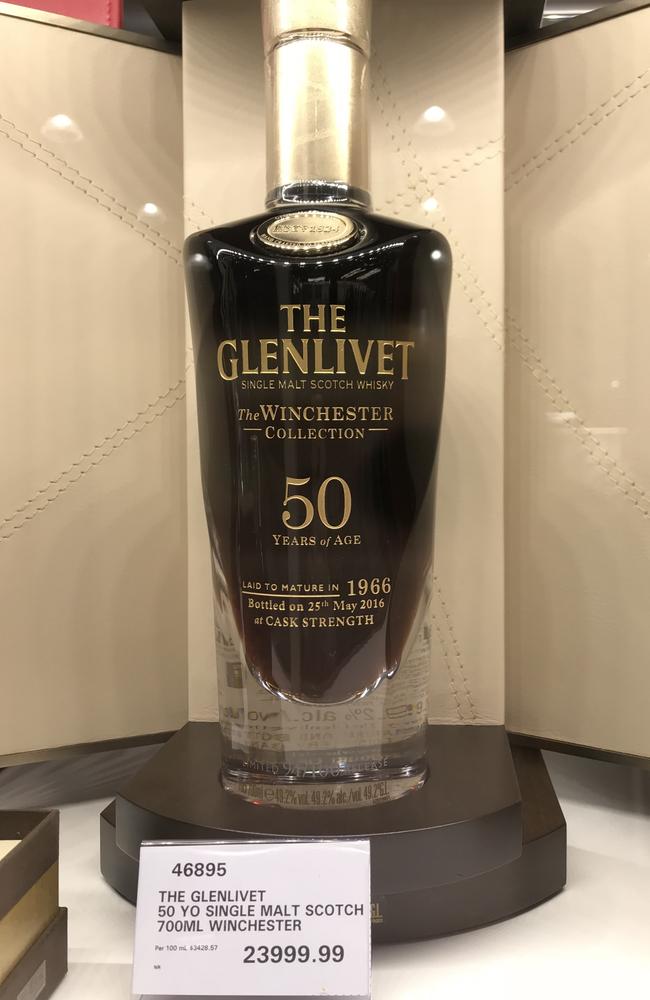 A $24,000 bottle of scotch sits beside more affordable tipples like Jack Daniels.