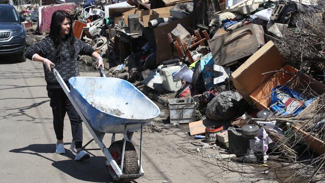 Maribyrnong residents in Victoria clean up after local flooding. Picture: David Crosling