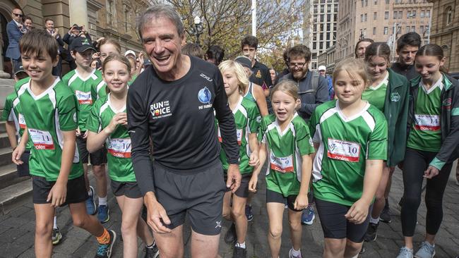 Former ultra-marathon runner and Liberal MP Pat Farmer starts the six-month Run for the Voice campaign at Town Hall, Hobart, on Monday. Picture: Chris Kidd