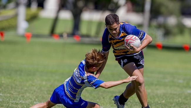 Day One of King of the Country rugby tournament at James Overell Park, Southport. possible. Sunshine Coast Invitational Barbarians U13s (Blue/yellow with ball) v USQ Saints U13s. Picture: Jerad Williams